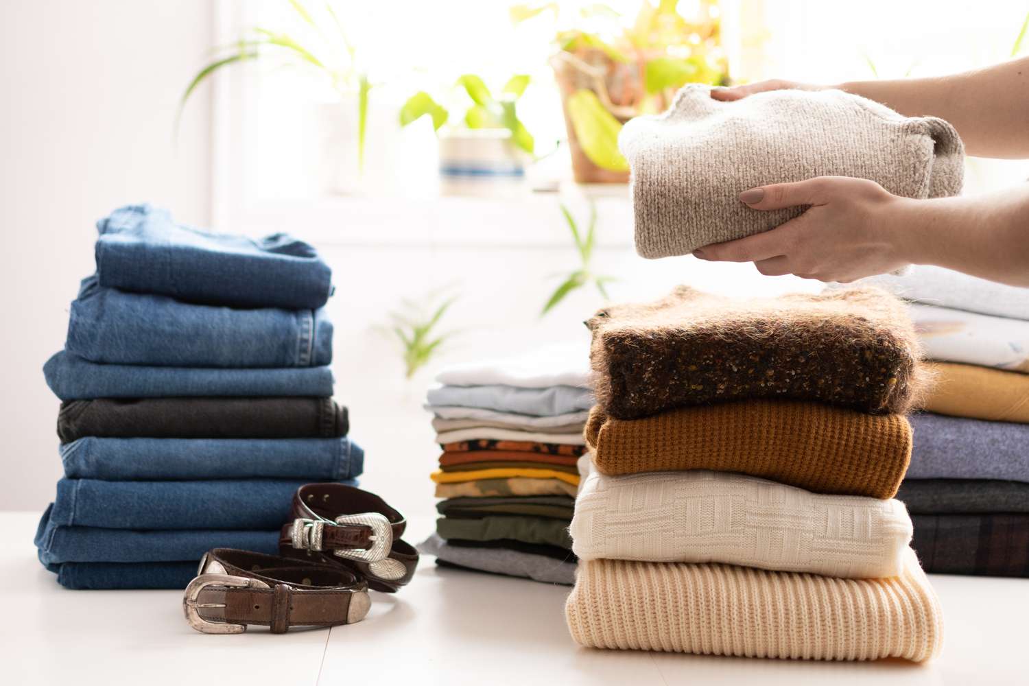 Garments organized and sorted into categories.